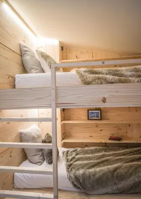 Un ou plusieurs lits dans un hébergement de l'établissement Magnifique Duplex Oneigedor Départ ski aux pieds et vue montagne