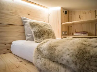 Un ou plusieurs lits dans un hébergement de l'établissement Magnifique Duplex Oneigedor Départ ski aux pieds et vue montagne