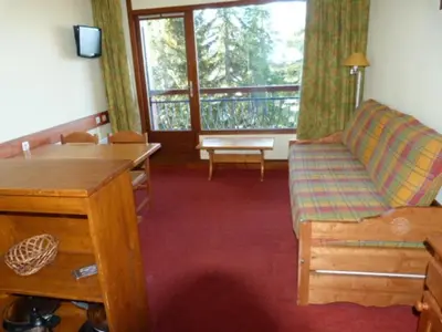 Coin salon dans l'établissement Appartement 2 pièces, balcon, animaux admis, Arc 1800 - FR-1-411-436