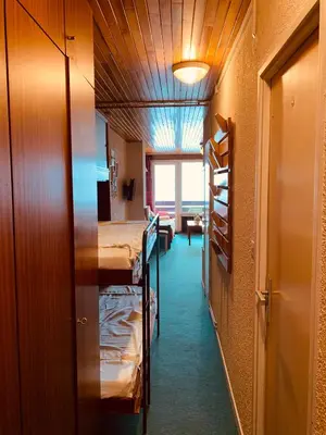 Un ou plusieurs lits dans un hébergement de l'établissement Les Hauts du Val Claret - A2 appartement 19