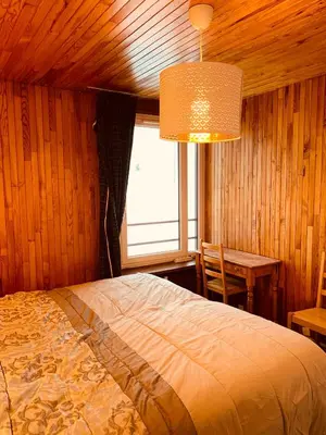 Un ou plusieurs lits dans un hébergement de l'établissement Les Hauts du Val Claret - A2 appartement 19