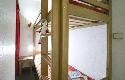 Un ou plusieurs lits dans un hébergement de l'établissement Résidence Odalys Les Hauts du Rogoney