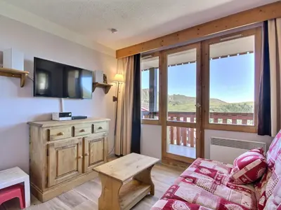 Un ou plusieurs lits dans un hébergement de l'établissement Studio cabine 4 pers, balcon, proche pistes - FR-1-455-163