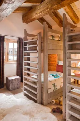 Un ou plusieurs lits dans un hébergement de l'établissement Eleven Chalet Hibou