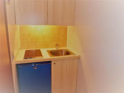 Cuisine ou kitchenette dans l'établissement Studio cosy à Tignes, confort montagnard pour 2 personnes - FR-1-411-488