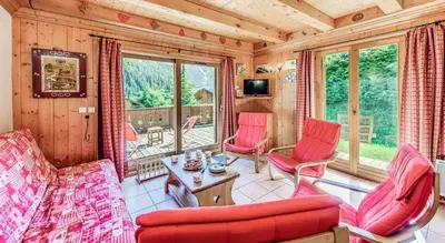 Télévision ou salle de divertissement dans l'établissement Résidence Les Soldanelles - Chalets pour 10 Personnes MAE-2760