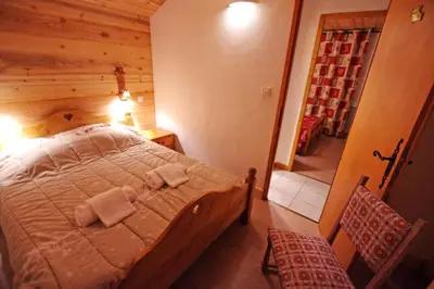 Un ou plusieurs lits dans un hébergement de l'établissement Résidence L'echayer - Chalets pour 12 Personnes MAE-3285