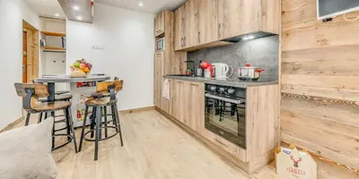 Cuisine ou kitchenette dans l'établissement Résidence Hameaux De Toviere - Terrasse de 35m², un emplacement unique à TIGNES MAE-2591