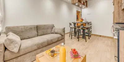 Coin salon dans l'établissement Résidence Hameaux De Toviere - Terrasse de 35m², un emplacement unique à TIGNES MAE-2591