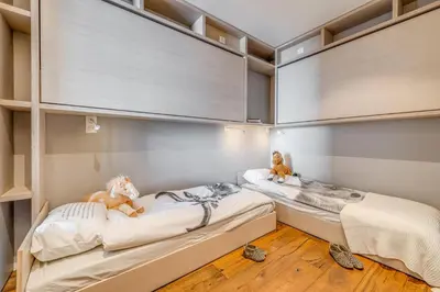 Un ou plusieurs lits dans un hébergement de l'établissement Résidence Combe Folle - Appartement rénové 3 - Terrasse - vue lac MAE-3384