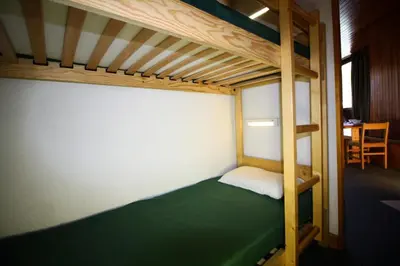 Un ou plusieurs lits dans un hébergement de l'établissement Résidence Roches Rouges C - studio confortable, pied des pistes MAE-3580