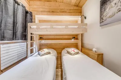 Un ou plusieurs lits dans un hébergement de l'établissement Résidence MoutiÈres B - Appartement duplex rénové 4, confortable MAE-3382