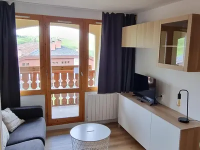 Télévision ou salle de divertissement dans l'établissement Belle Plagne appartement pour 5 personnes