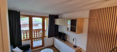 Télévision ou salle de divertissement dans l'établissement Belle Plagne appartement pour 5 personnes