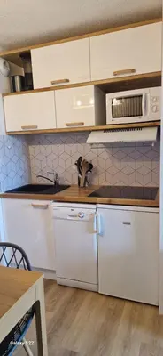 Cuisine ou kitchenette dans l'établissement Belle Plagne appartement pour 5 personnes