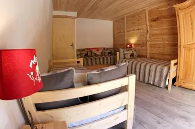 Coin salon dans l'établissement Chalet La Fontanette