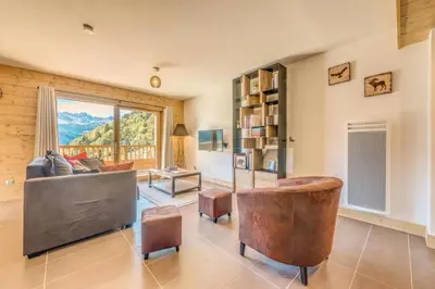 Coin salon dans l'établissement Résidence Les Balcons EtoilÉs - Appartement 4 au pied des pistes MAE-3258