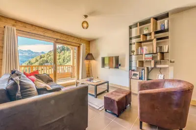 Coin salon dans l'établissement Résidence Les Balcons EtoilÉs - Appartement 4 au pied des pistes MAE-3258