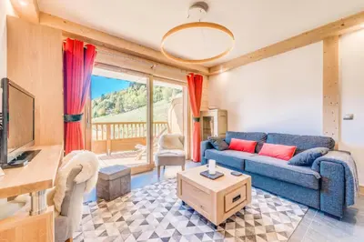 Télévision ou salle de divertissement dans l'établissement Résidence Les Balcons EtoilÉs - Appartement 4 au pied des pistes MAE-3260