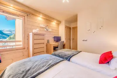 Un ou plusieurs lits dans un hébergement de l'établissement Résidence Les Balcons EtoilÉs - Appartement 4 au pied des pistes MAE-3260