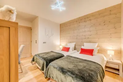 Un ou plusieurs lits dans un hébergement de l'établissement Résidence Les Balcons EtoilÉs - Appartement 4 au pied des pistes MAE-3260