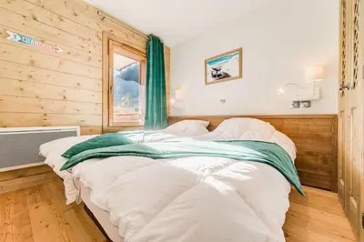 Un ou plusieurs lits dans un hébergement de l'établissement Résidence Les Balcons EtoilÉs - Appartement 4 au pied des pistes MAE-3261