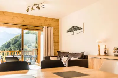 Coin salon dans l'établissement Résidence Les Balcons EtoilÉs - Appartement 4 au pied des pistes MAE-3263