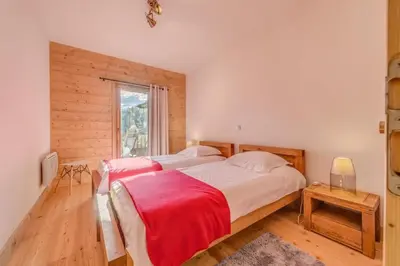 Un ou plusieurs lits dans un hébergement de l'établissement Résidence Les Balcons EtoilÉs - Appartement 4 au pied des pistes MAE-3263