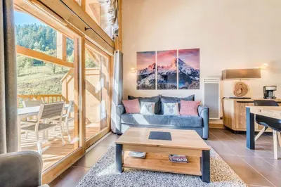 Coin salon dans l'établissement Résidence Les Balcons EtoilÉs - Appartement 4 au pied des pistes MAE-3264