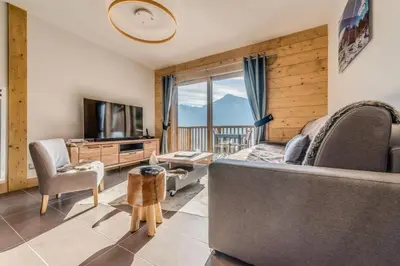 Télévision ou salle de divertissement dans l'établissement Résidence Les Balcons EtoilÉs - Appartement 4 au pied des pistes MAE-3268