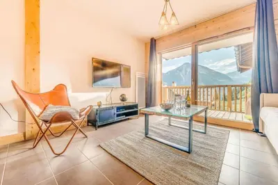Coin salon dans l'établissement Résidence Les Balcons EtoilÉs - Appartement 4 au pied des pistes MAE-3273