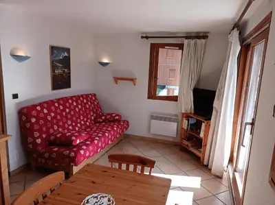 Coin salon dans l'établissement Résidence Le Chardonnet - Appartement à 200 m des psites avec belle vue MAE-3275