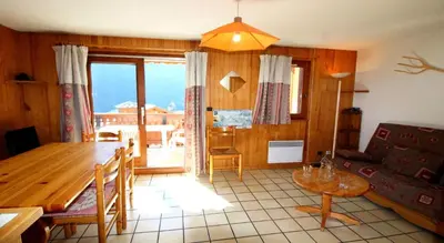 Coin salon dans l'établissement Résidence Le Chardonnet - Appartement à 200 m des psites avec belle vue MAE-3278