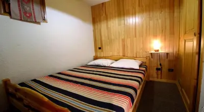 Un ou plusieurs lits dans un hébergement de l'établissement Résidence Le Chardonnet - Appartement à 200 m des psites avec belle vue MAE-3278