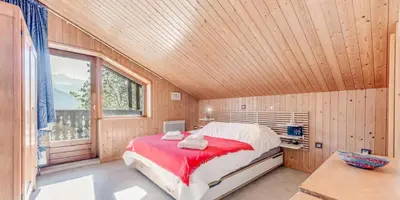 Un ou plusieurs lits dans un hébergement de l'établissement Résidence Hameau Des Rochers - Chalets pour 14 Personnes MAE-3284