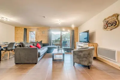 Coin salon dans l'établissement Résidence Les Balcons EtoilÉs - Appartement 4 au pied des pistes MAE-3289