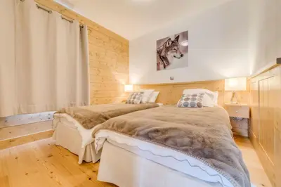 Un ou plusieurs lits dans un hébergement de l'établissement Résidence Les Balcons EtoilÉs - Appartement 4 au pied des pistes MAE-3304