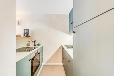 Cuisine ou kitchenette dans l'établissement Résidence Le Chardonnet - 3 Pièces pour 7 Personnes MAE-3309