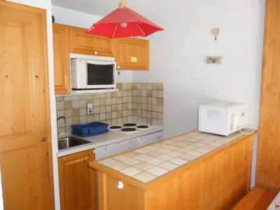 Cuisine ou kitchenette dans l'établissement Résidence Le Roselin - 2 Pièces pour 6 Personnes MAE-3317