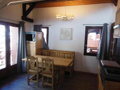 Coin salon dans l'établissement Chalet Fleur De Neige - 2 Pièces pour 4 Personnes MAE-3342