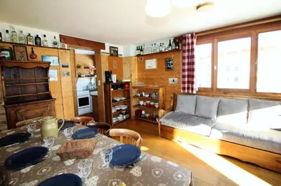 Coin salon dans l'établissement Chalet Bobech - chalet traditionnel, terrase plein sud MAE-3383