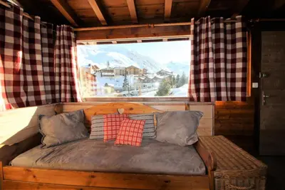 Coin salon dans l'établissement Chalet Bobech - chalet traditionnel, terrase plein sud MAE-3383