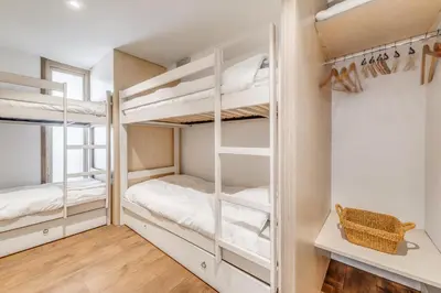 Un ou plusieurs lits dans un hébergement de l'établissement Résidence Palafour - Appartement 3 - vue lac - 80m2 - 8 personnes MAE-3419