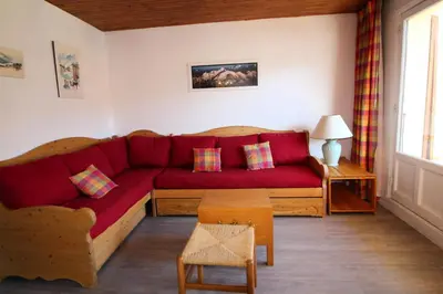 Coin salon dans l'établissement Résidence Armaillis - Appartment familial, confortable, vue lac MAE-3427