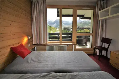 Un ou plusieurs lits dans un hébergement de l'établissement Résidence Tour Du Lac - Vue spectaculaire sur le cirque naturel de TIGNES. MAE-3482