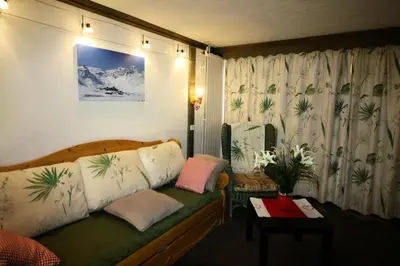 Coin salon dans l'établissement Résidence Palafour - Studio chaleureux, terrasse vue lac MAE-3615