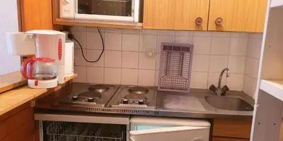 Cuisine ou kitchenette dans l'établissement Résidence Rond Point Des Pistes - proximité immédiate des pistes et des remontées mécaniques (Funiculaire) MAE-3681