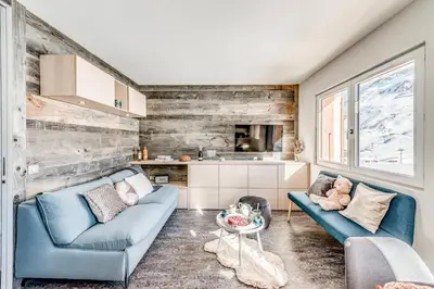 Coin salon dans l'établissement Résidence Armaillis - Appartement rénové, vue lac MAE-3743