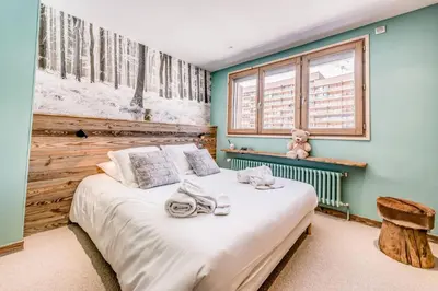 Un ou plusieurs lits dans un hébergement de l'établissement Résidence Shamrock - Appartement 3 magnifiquement rénové - belle vue lac MAE-3758