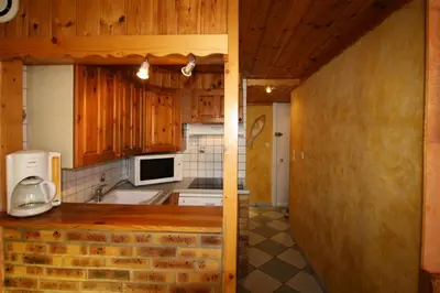 Cuisine ou kitchenette dans l'établissement Résidence Palafour - 1 séjour canapé lit, 1 cabine lit superposés - balcon vue lac MAE-3762